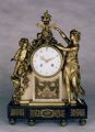 Pendule Louis XVI en marbre et bronzes dores